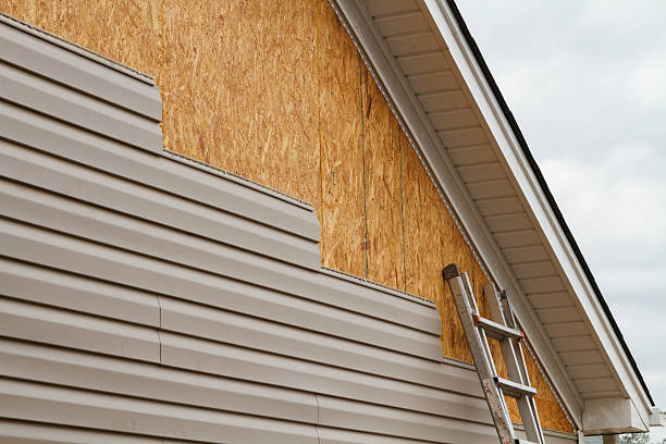 Professional Fiber Cement Siding technician working in East Northport, NY